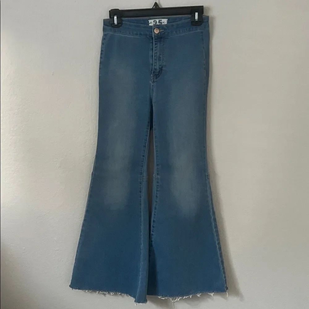 Like New! We The Free Blue Super Flare Raw Hem Retro Bell Bottom in Size 25